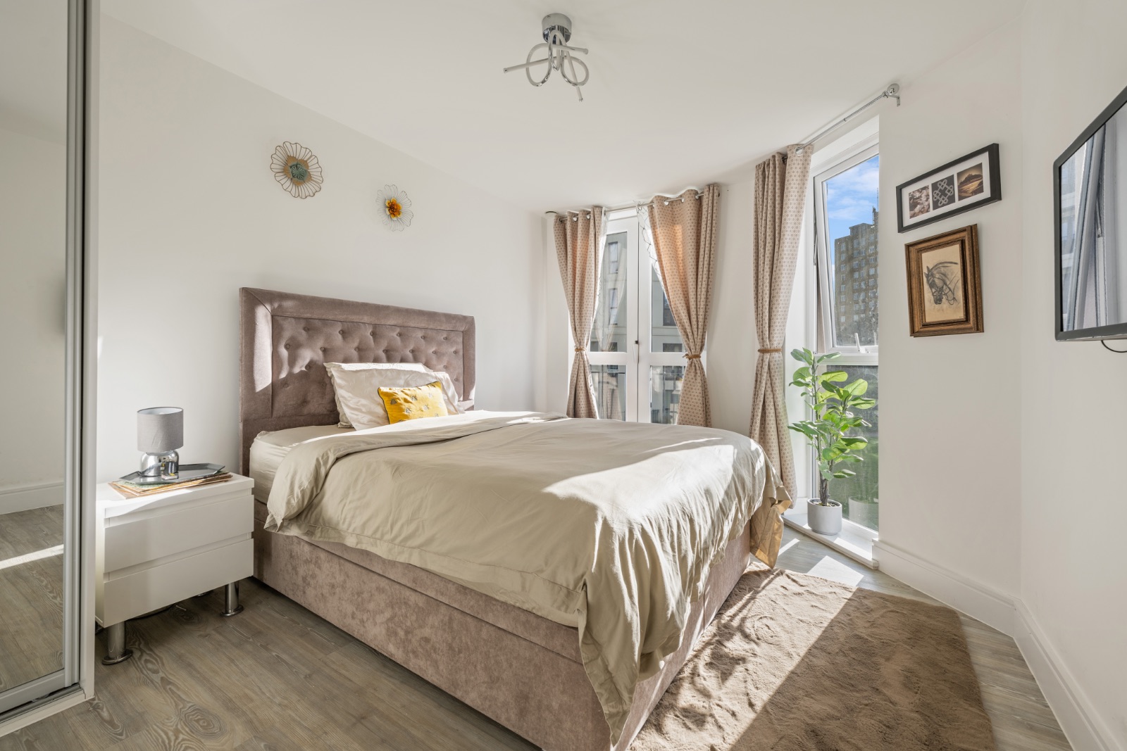Second bedroom with double bed, Juliet balcony and garden views